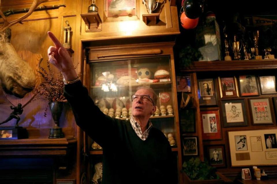 In this file photo, Jim Chappell talked about the many collectibles in his bar and restaurant, including the 1974 World Series Trophy and the 1958 Heisman Trophy. Chappell has sold the restaurant.