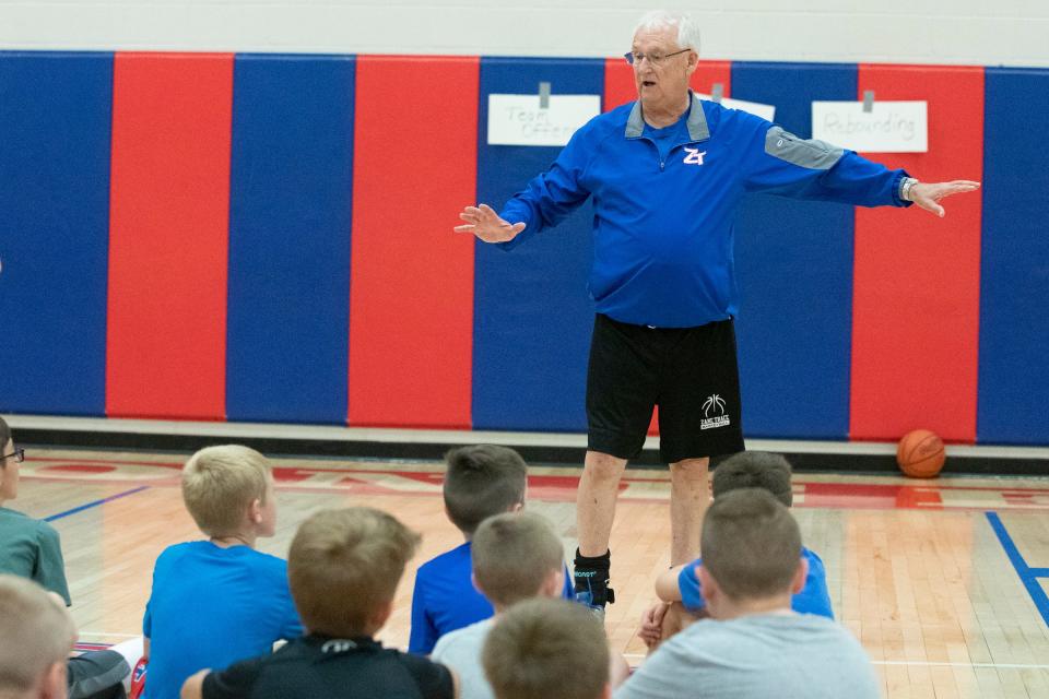 Zane Trace basketball coach Gary Kellough works with young athletes during his annual youth camp on June 2, 2021. 