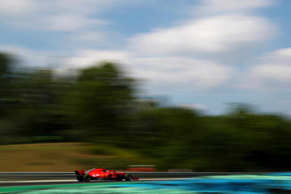 Red rocket: Kimi Raikkonen gets some practice F1 miles in at the Hungaroring