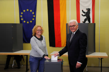 German President Frank-Walter Steinmeier casts his vote on election day in Berlin, Germany September 24, 2017. REUTERS/Stefanie Loos