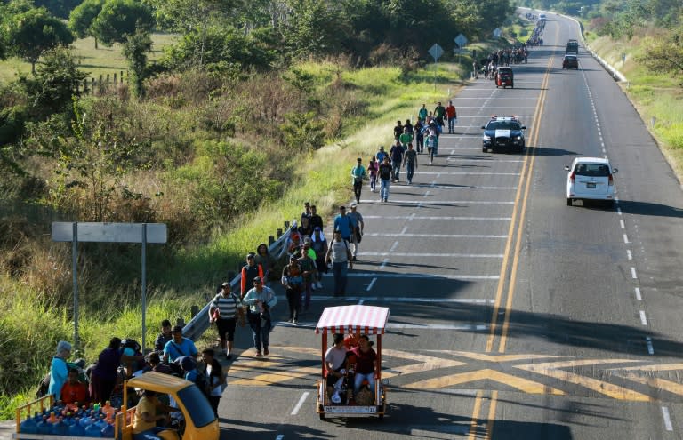 The caravan, pictured along the road between Ciudad Hidalgo and Tapachula, in Chiapas state, southern Mexico, set out from San Pedro Sula, in northwestern Honduras, and has grown along the way