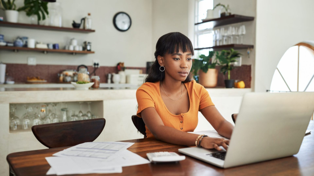  Woman working from home. 