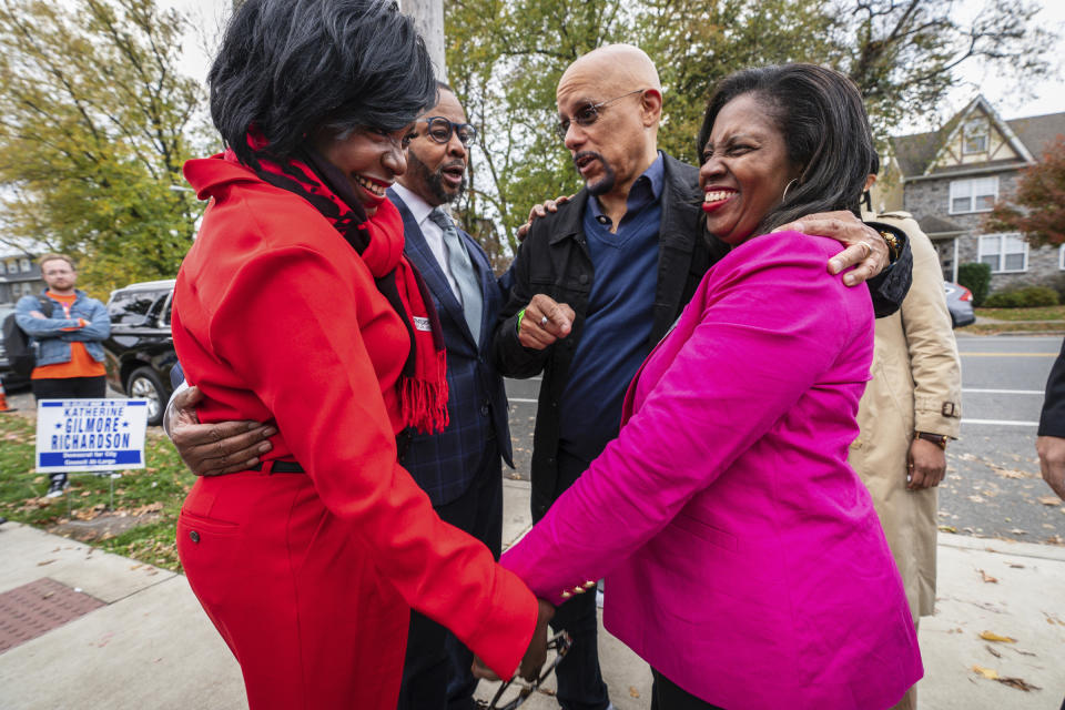 From left, mayoral candidate Cherelle Parker, council member Curtis Jones Jr., Pennsylvania Sen. Vincent Hughes and Judge Timika Lane stand outside Pinn Memorial Baptist Church, in Philadelphia, Tuesday, Nov. 7, 2023. (Jessica Griffin/The Philadelphia Inquirer via AP)