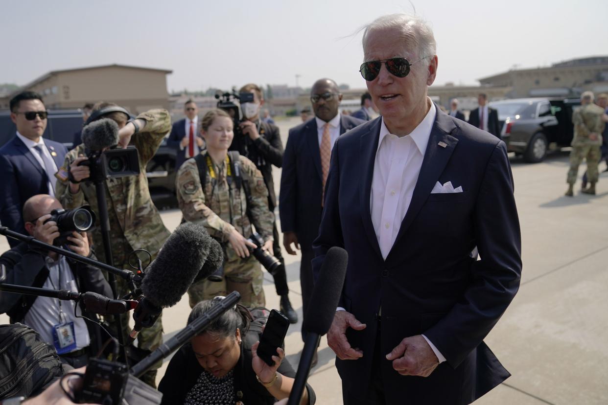 President Biden speaks before boarding Air Force One for a trip to Japan at Osan Air Base, Sunday, May 22, 2022, in Pyeongtaek, South Korea. (AP Photo/Evan Vucci)