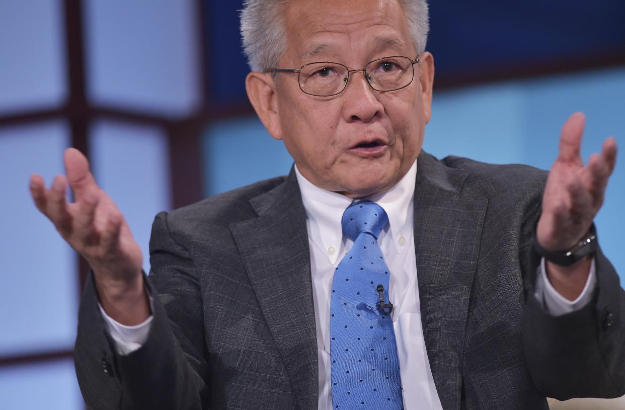 Ng Kok Song speaks during a discussion on ethics and finance at the 2014 IMF - World Bank Annual Meetings at George Washington University's Jack Morton Auditorium on October 12, 2014 in Washington, DC.