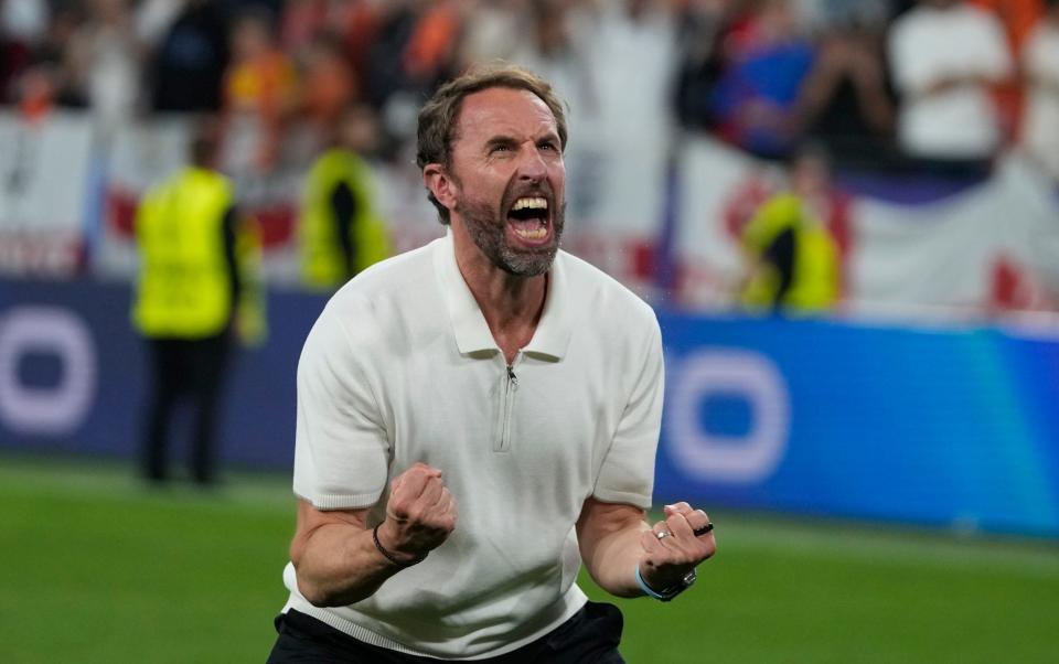 England's manager Gareth Southgate celebrates at the end of a semifinal against Netherlands at the Euro 2024 soccer tournament in Dortmund, Germany