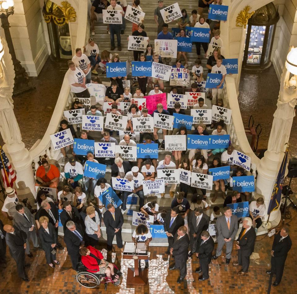 In this file photo, demonstrators from Erie rally June 7, 2016, in the state Capitol Rotunda in Harrisburg for more state funding for the Erie School District.