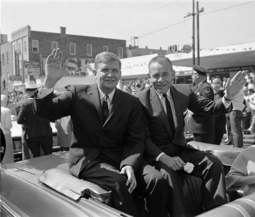 N.C. Gov. Terry Sanford (left) and N.C. Lt. Gov. Harvey Cloyd Philpott riding in the Azalea Festival parade in 1961