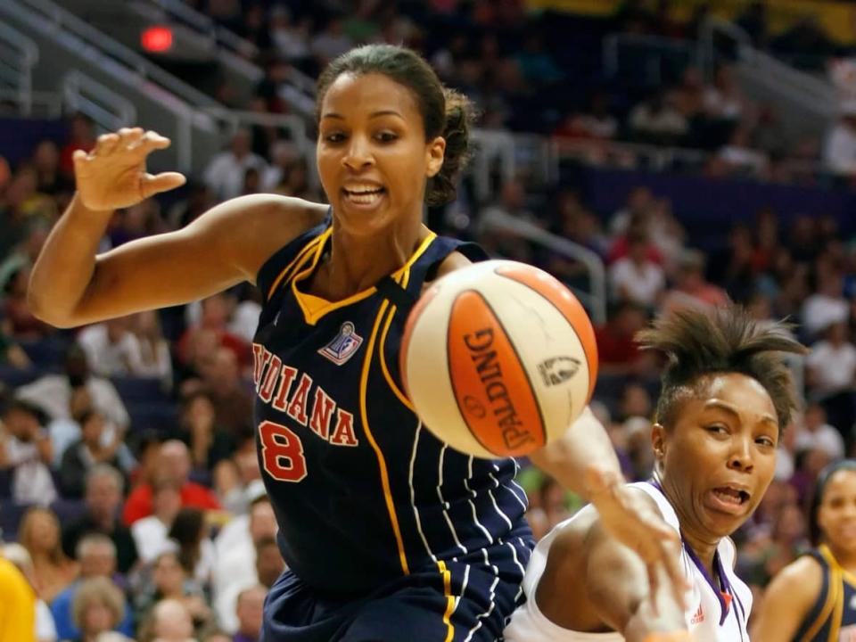 Former Olympian and WNBA star Tammy Sutton-Brown, seen playing for the Indiana Fever in 2009, now serves under the title of Associate Basketball & Franchise Operations and Director of Player Development for the Raptors 905 — Toronto's G-League affiliate. (Rick Scuteri/Reuters - image credit)