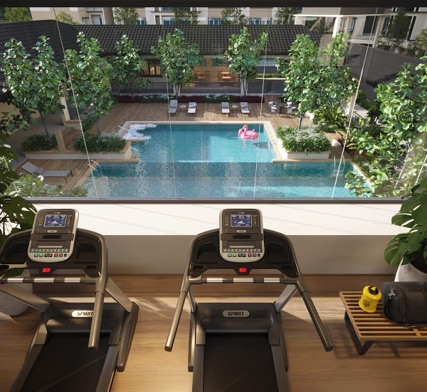 Take in the relaxing view of the swimming pool from the elevated gym at Daffodil Residency.