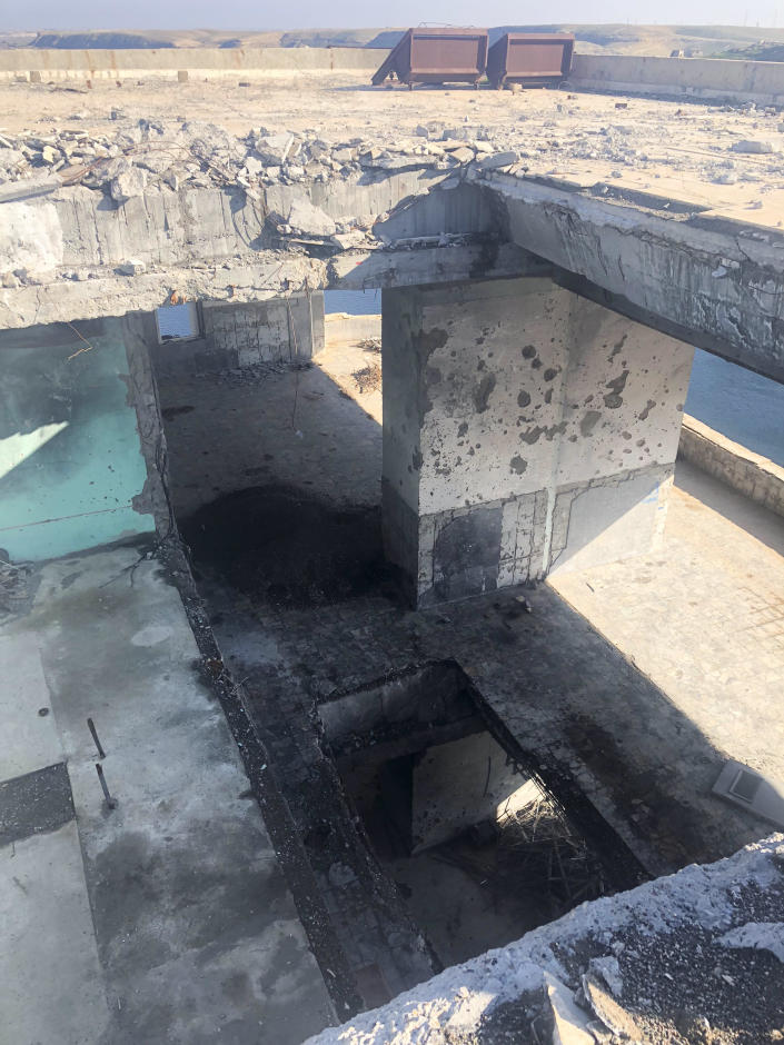 Damage where a coalition missile penetrated five stories of the Tabqa Dam&#39;s north tower in Syria, Dec. 15, 2008. (Azmat Khan/The New York Times)