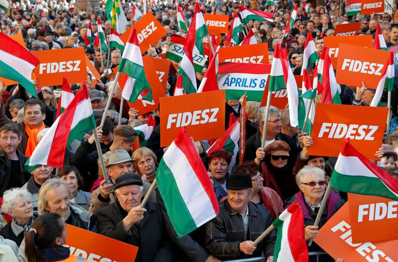 FILE PHOTO: Supporters of Hungarian Prime Minister Viktor Orban are seen before his campaign closing rally in Szekesfehervar