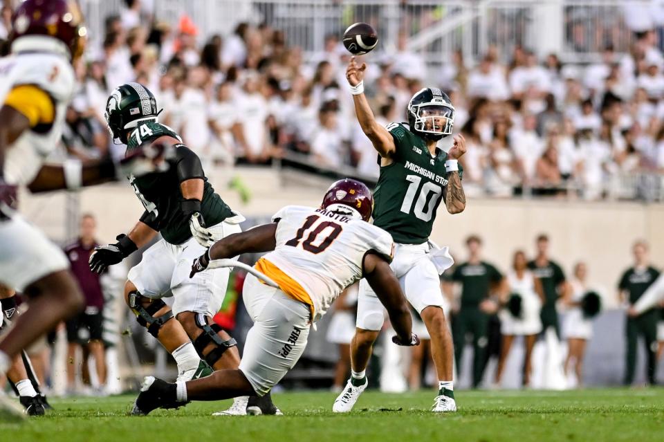 Michigan State's Noah Kim throws a pass against Central Michigan during the second quarter on Friday, Sept. 1, 2023, at Spartan Stadium in East Lansing.