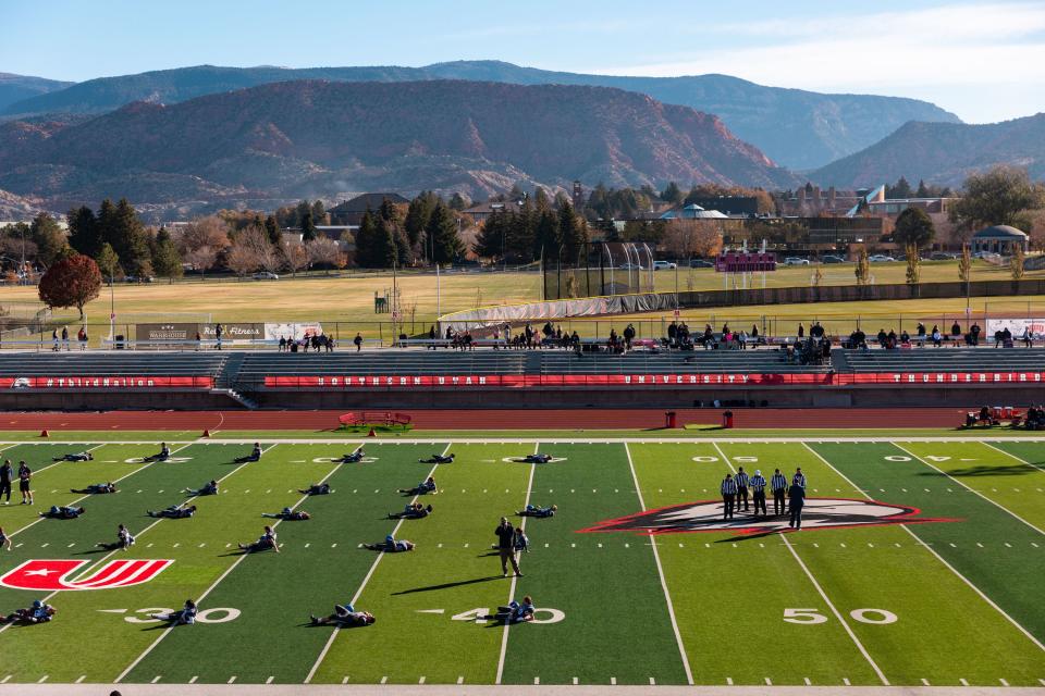 Players stretch before the game between Rich High School and Monticello High School for the 1A 8-player football state championship at Southern Utah University in Cedar City on Saturday, Nov. 11, 2023. | Megan Nielsen, Deseret News