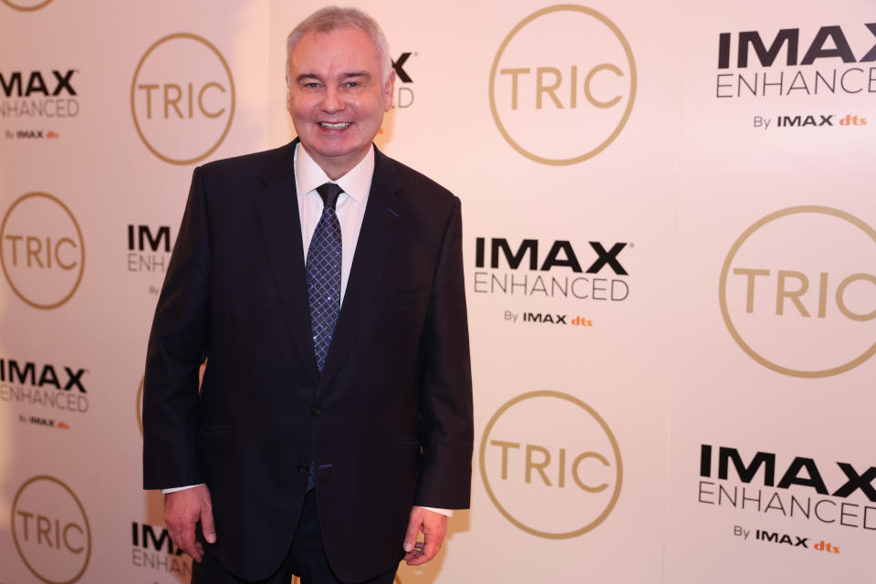 Eamonn Holmes wears a suit and tie