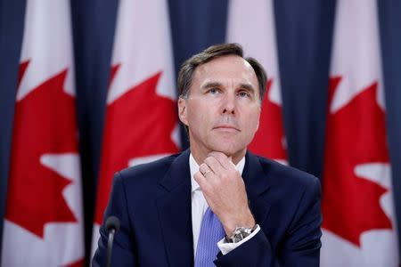 FILE PHOTO: Canada's Finance Minister Bill Morneau takes part in a news conference in Ottawa, Ontario, Canada, July 18, 2017. REUTERS/Chris Wattie/File Photo