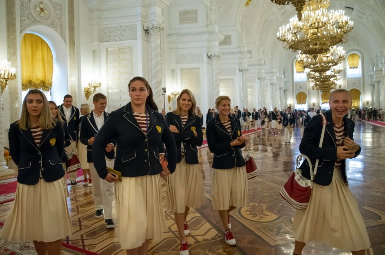 Russian athletes pictured after attending President Putin's reception for members of the country's Olympic team at the Kremlin in Moscow on July 27, 2016