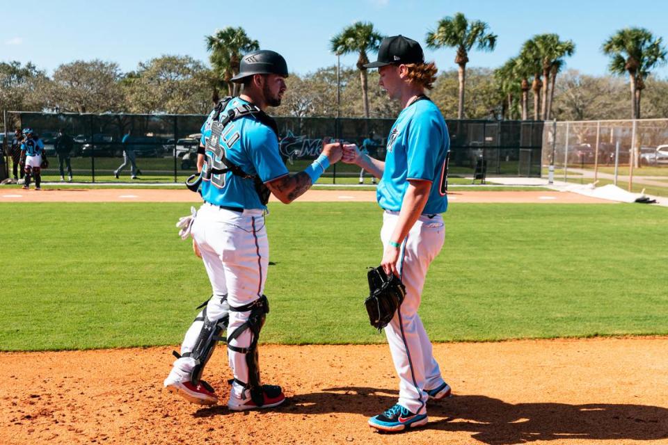 Miami Marlins Will Banfield and Max Meyer during 2021 Spring Training on February 10, 2021 at the Miami Marlins Spring Training facility at Roger Dean Chevrolet Stadium in Jupiter, Florida.
