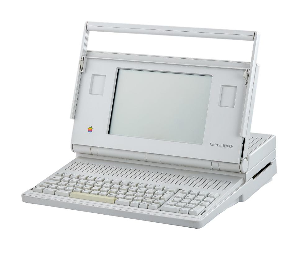 1989 Macintosh Portable demonstration unit with a handle, small screen, and keyboard