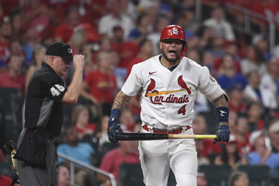 St. Louis Cardinals' Yadier Molina reacts after striking out during the eighth inning of the team's baseball game against the Chicago Cubs on Wednesday, July 21, 2021, in St. Louis. (AP Photo/Joe Puetz)