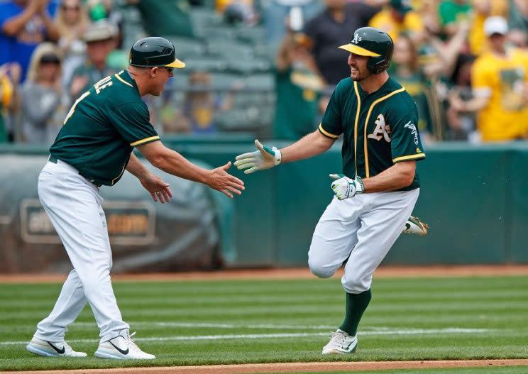 Adam Rosales of the Oakland Athletics races around with another record-setting home run trot. (Getty Images) 