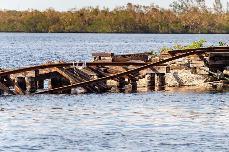 Hurricane Ian appears to have damaged portions of the train bridge over the Caloosahatchee River, sending pieces of crossties into residents' yards.Monday, Oct. 3, 2022.