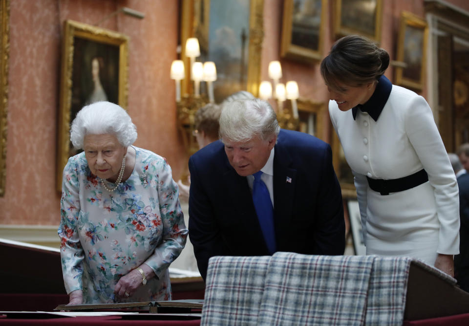 President Donald Trump, first lady Melania Trump, right, and Queen Elizabeth II, walk in the Picture Gallery at Buckingham Palace, Monday, June 3, 2019, in London. (Photo: Alex Brandon/AP)