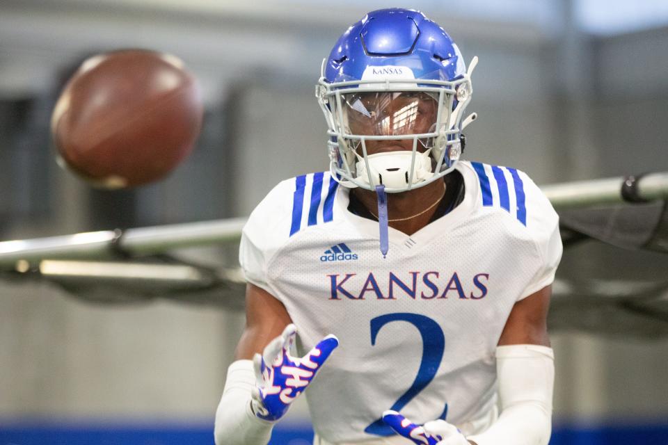 Kansas cornerback Cobee Bryant watches the ball during a drill at practice at the indoor practice facility in Lawrence.