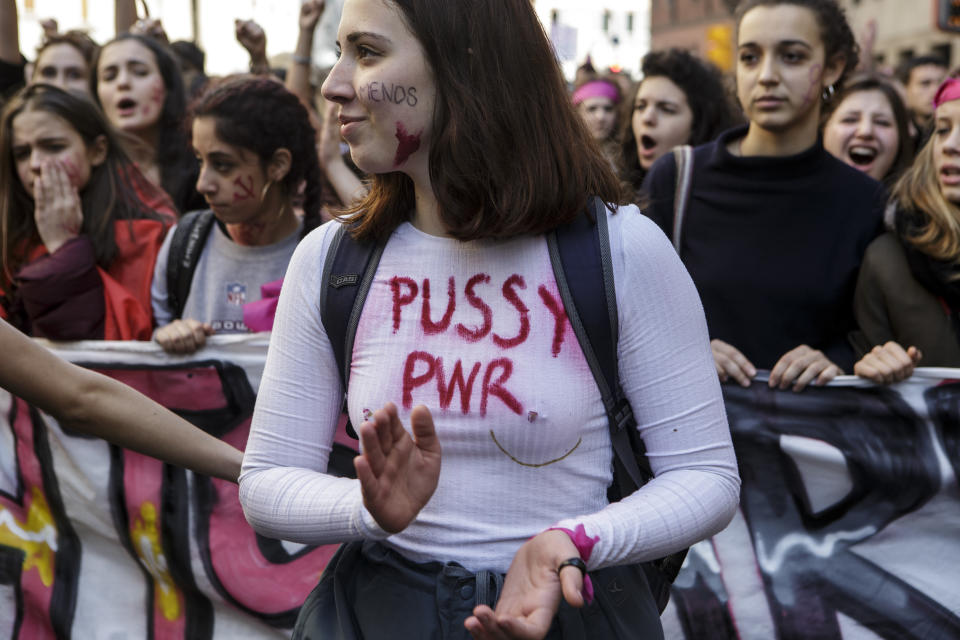 <p>A young woman wearing a T-shirt reading “Pussy Power” takes part in a rally, demonstrating against gender violence and calling for gender parity on March 8, 2018, in Milan, Italy. (Photo: Emanuele Cremaschi/Getty Images) </p>