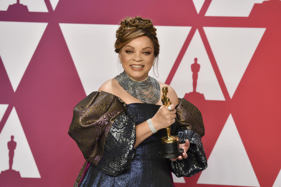 Ruth E. Carter poses with the award for best costume design for "Black Panther" in the press room at the Oscars on Sunday, Feb. 24, 2019, at the Dolby Theatre in Los Angeles. (Photo by Jordan Strauss/Invision/AP)
