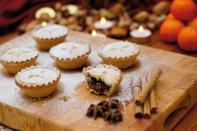 <p>A popular British Christmas tradition you may have heard of is the mince pie. According to <em><a href="http://www.bbcamerica.com/anglophenia/2011/12/a-very-british-christmas-part-2-mince-pies" rel="nofollow noopener" target="_blank" data-ylk="slk:BBC;elm:context_link;itc:0;sec:content-canvas" class="link ">BBC</a></em>, this is a tradition that can be dated all the way back to the 13th century. When knights returned from the Crusades with new spices like nutmeg, cloves, and cinnamon, they were made into a big pie with a dried fruit mixture called "mincemeat." It became known as Christmas pie and was once banned by Puritans for being unholy. <a href="http://projectbritain.com/Xmas/christmaspudding.html" rel="nofollow noopener" target="_blank" data-ylk="slk:Christmas pudding;elm:context_link;itc:0;sec:content-canvas" class="link ">Christmas pudding</a>, a brown pudding with raisins, nuts, and cherries (similar to fruitcake), is another tradition. </p>