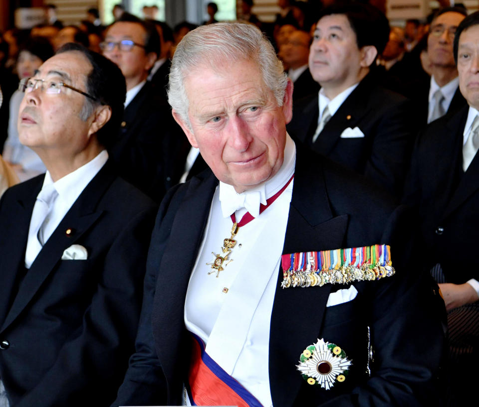 Britain's Prince Charles attends the enthronement ceremony of Japan's Emperor Naruhito at the Imperial Palace, in Tokyo, Tuesday, Oct. 22, 2019. Japan's Naruhito proclaimed himself Emperor during an enthronement ceremony at the Imperial Palace, declaring himself the country's 126th monarch.(Kyodo News via AP)