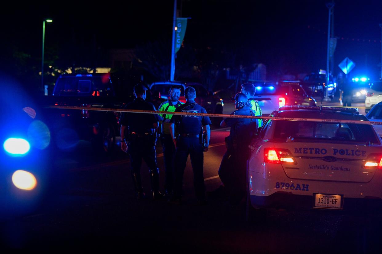 A large police presence blocked traffic on Division Street and 8th Avenue on Thursday, June 2, 2022, after a liquor store security guard was fatally shot.