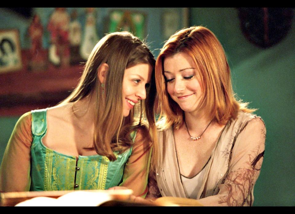 You can just call Willow (Alyson Hannigan) and Tara (Amber Benson) the Wiccans that stole our hearts. From their budding romance that grew along with their powers to the tragic end, Willow and Tara were the couple we loved to love. If Tara was under Willow's spell (yes, we're referencing Tara's song in "Once More With Feeling" and the fact that Willow really did cast spells on Tara, grrr), then we were under theirs.