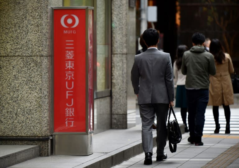 Shares of Japanese financial giant Mitsubishi UFJ plunged almost eight percent in trading in Tokyo on Febuary 9, 2016