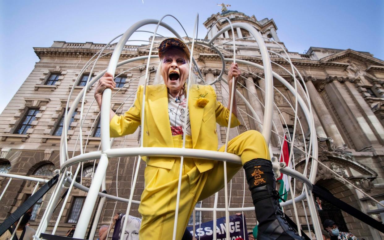 Dame Vivienne Westwood demonstrated inside a giant bird cage to protest against any extradition to the US of Wikileaks founder Julian Assange. - Julian Simmonds/The Telegraph