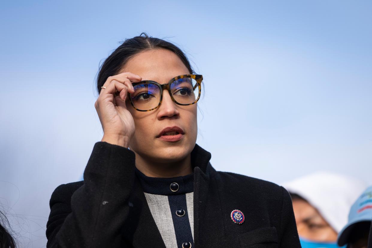 Rep. Alexandria Ocasio-Cortez (D-NY) prepares to speak during a rally for immigration provisions to be included in the Build Back Better Act outside the U.S. Capitol  December 7, 2021 in Washington, DC.