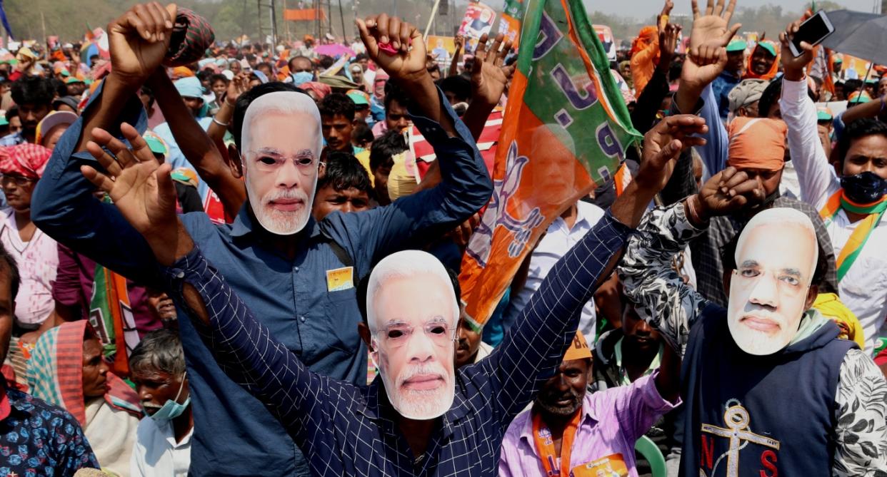 BJP supporters gesture during a mass rally addressed by PM Modi at Brigade Parade ground in Kolkata on March 7, 2021. Photo: Dipa Chakraborty/Pacific Press/LightRocket via Getty Images