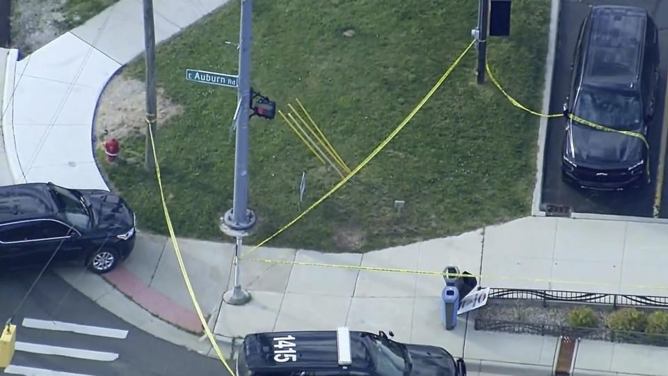 Police respond to the scene of a shooting at the Brooklands Plaza Splash Pad, Saturday, June 15, 2024, in Rochester Hills, Mich. The Oakland County Sheriff’s Office says there are “numerous wounded victims” after police were called for an active shooter. (WXYZ via AP)