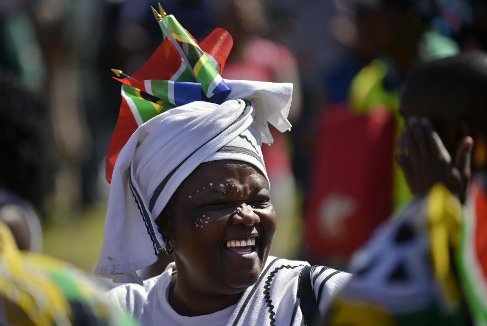 A woman cheers during Freedom Day celebrations at the Union Buildings in Pretoria