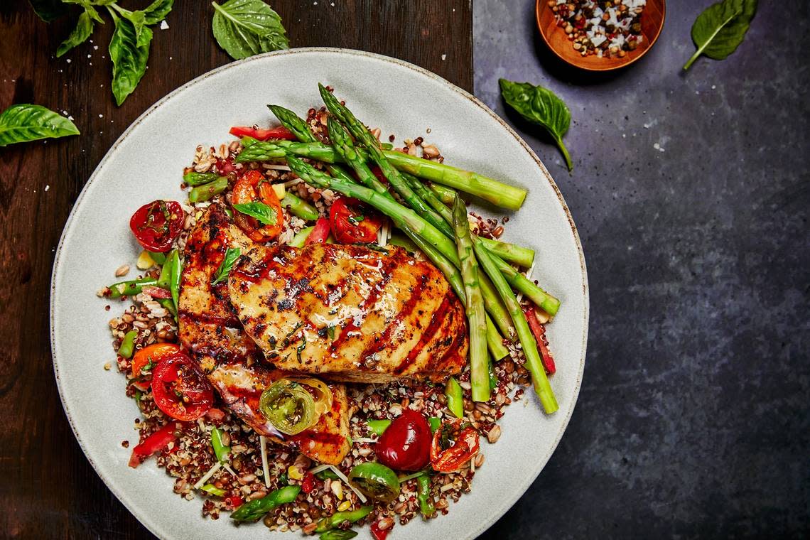 The honey garlic chicken with grain salad at Firebirds.