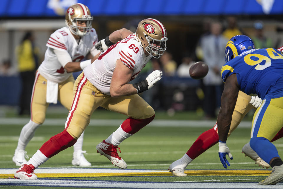 FILE - San Francisco 49ers' Mike McGlinchey (69) runs during an NFL football game against the Los Angeles Rams, Oct. 30, 2022, in Inglewood, Calif. The Denver Broncos strengthened their offensive line on Monday, March 13, 2023, agreeing to a deals with right tackle McGlinchey and left guard Ben Powers, a person familiar with the moves told The Associated Press. (AP Photo/Kyusung Gong, File)