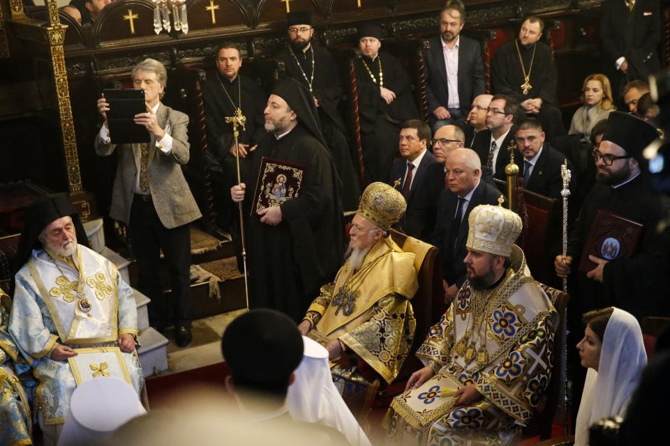 Ecumenical Patriarch Bartholomew I, third right, and Metropolitan Epiphanius, the head of the independent Ukrainian Orthodox Church, second right, attend a religion service at the Patriarchal Church of St. George in Istanbul, Sunday, Jan. 6, 2019. An independent Ukrainian Orthodox church has been created at a signing ceremony in Turkey, formalizing a split with the Russian church it had been tied to since 1686. (AP Photo/Lefteris Pitarakis)