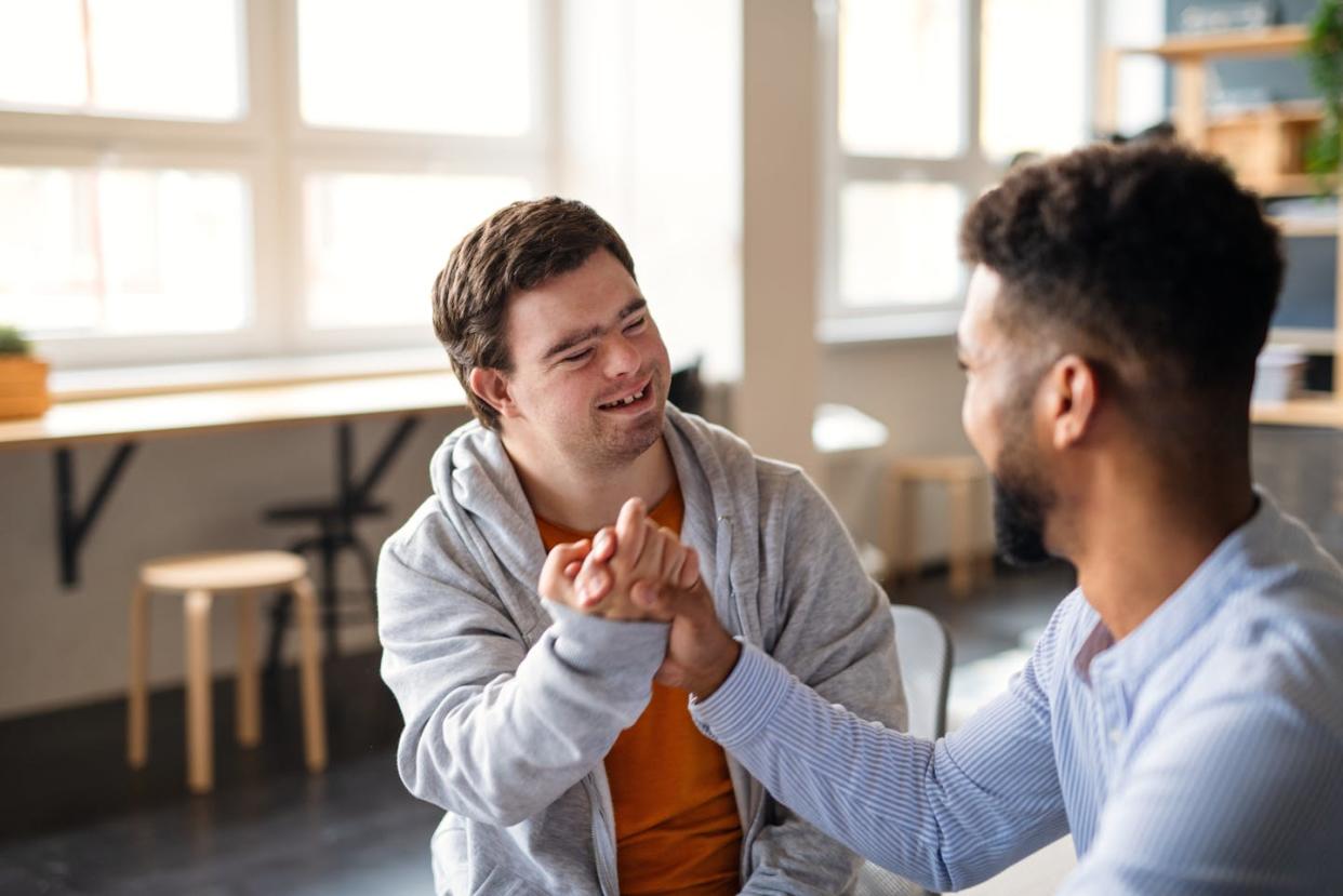 <a href="https://www.shutterstock.com/es/image-photo/young-happy-man-down-syndrome-his-2063272721" rel="nofollow noopener" target="_blank" data-ylk="slk:Ground Picture/Shutterstock;elm:context_link;itc:0;sec:content-canvas" class="link ">Ground Picture/Shutterstock</a>