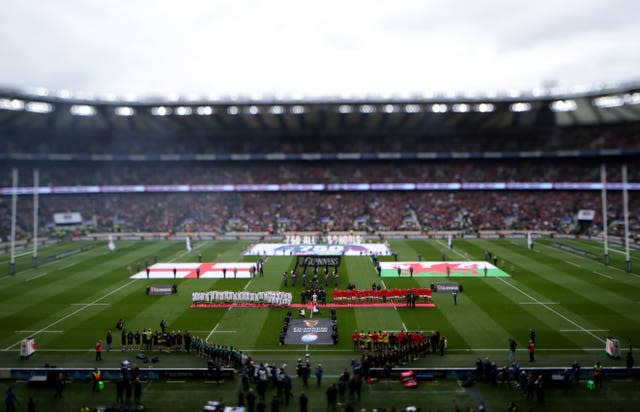 Both teams line-up for the national anthem before a Guinness Six Nations match at Twickenham