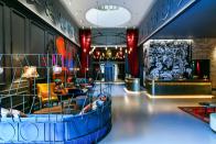<p>This Andaz outpost is close enough to London’s Liverpool Street Station that even those bringing several suitcases won’t need to worry. It’s not only a conveniently located railway hotel, but it’s one of the capital’s more <a href="https://www.goodhousekeeping.com/uk/lifestyle/travel/g34667984/quirky-unusual-hotels-uk/" rel="nofollow noopener" target="_blank" data-ylk="slk:unusual places to stay" class="link ">unusual places to stay</a>, too. <br> <br>Along with quirky design details such as bright pink sofas and colourful murals, the hotel has a masonic temple that dates back to 1912, as well as a listed ballroom that has a stained-glass dome. The location puts guests within easy reach of Shoreditch, Brick Lane and Spitalfields Market.</p><p><a class="link " href="https://www.booking.com/hotel/gb/andaz-liverpool-street-london.en-gb.html?aid=1922306&label=station-hotels" rel="nofollow noopener" target="_blank" data-ylk="slk:CHECK AVAILABILITY">CHECK AVAILABILITY</a></p>