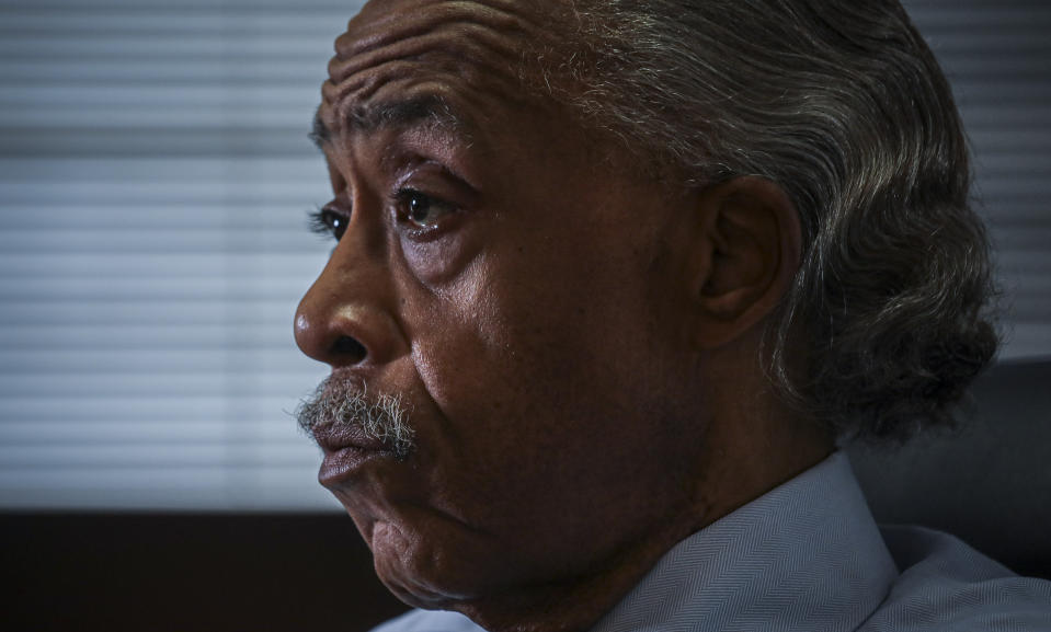 The Rev. Al Sharpton listens during an interview at his office, Thursday, July 30, 2020, in New York. For more than three decades, Sharpton, 65, has been an advocate for Black American families seeking justice in the wake of violence that highlight systemic racism. (AP Photo/Bebeto Matthews)