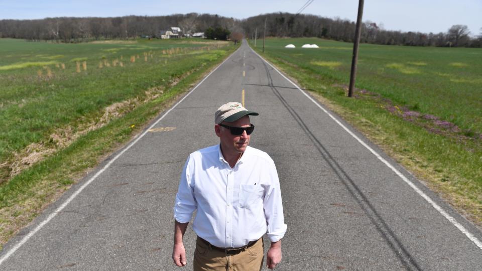 Springfield Township Mayor David Frank stands on Arney's Mount-Birmingham Road.  The farm across the road was at the center of a battle the municipality recently won in Burlington County Superior Court to block a project by housing developer DR Horton.  PHOTO: April 9, 2024.