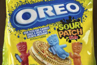 A package of Oreo Sour Patch Kids cookies is shown on Monday, May 23, 2024, in Ann Arbor, Mich. Surprising flavor combinations – including Sour Patch Kids Oreos -- are showing up more frequently in grocery stores and restaurant chains. (AP Photo/Dee-Ann Durbin)