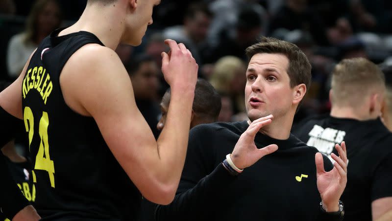 Utah Jazz coach Will Hardy talks to center Walker Kessler during a game against Indiana at the Delta Center in Salt Lake City on Monday, Jan. 15, 2024.